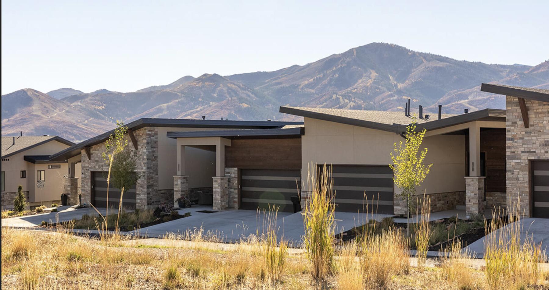 The homes on North Groves Edge Drive, with the Wasatch range behind them